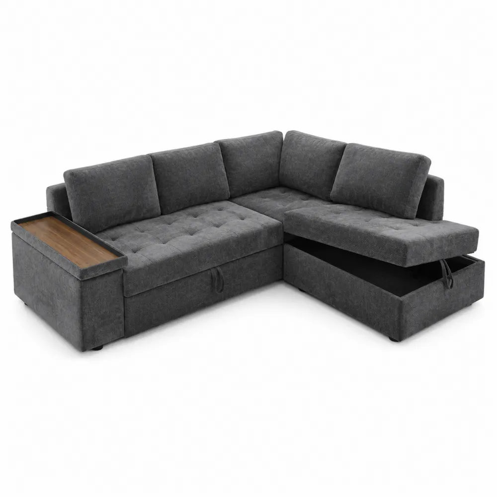 Divano letto angolare in tessuto grigio con tavolino in legno e c