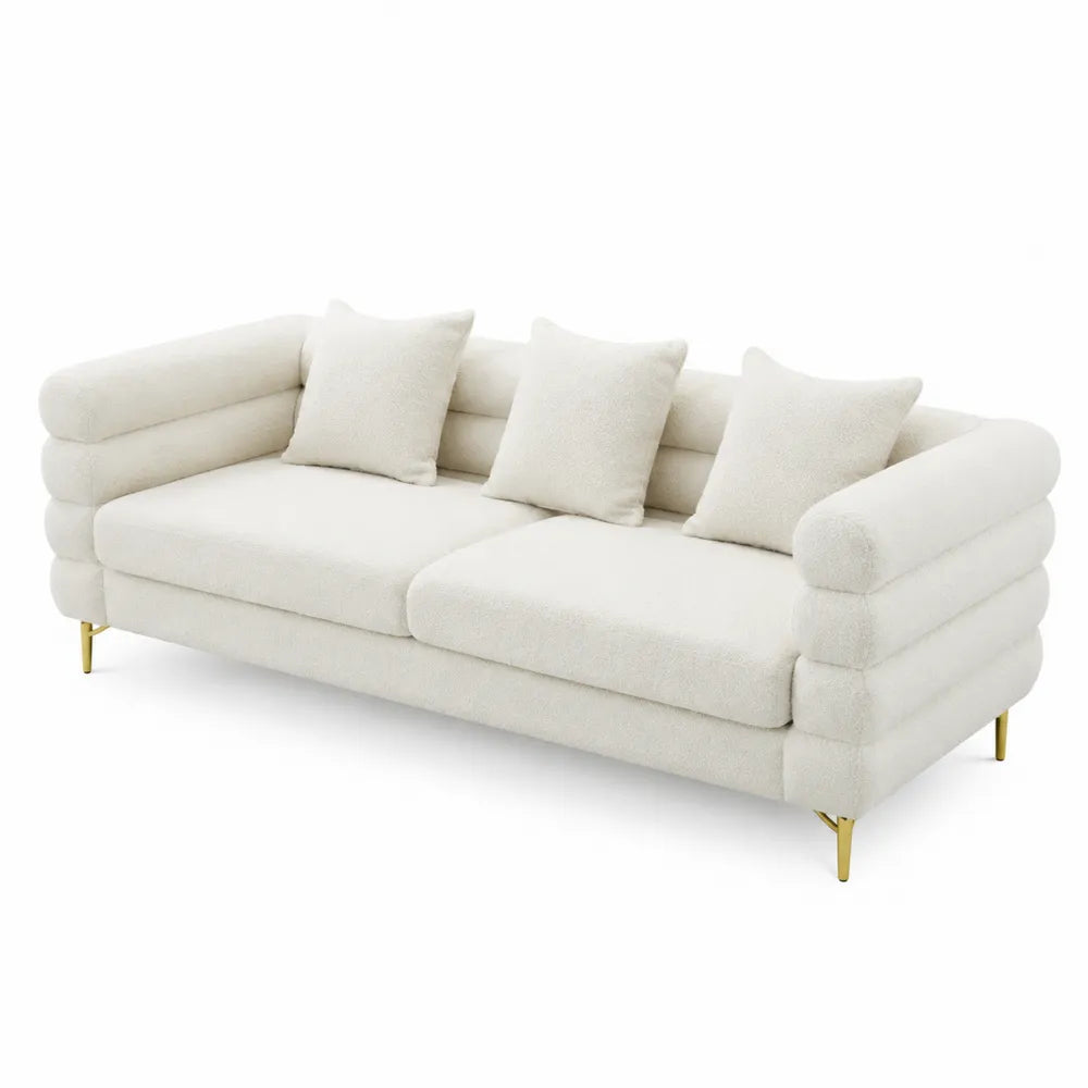 Divano in boucl¨¦ con gambe in meta